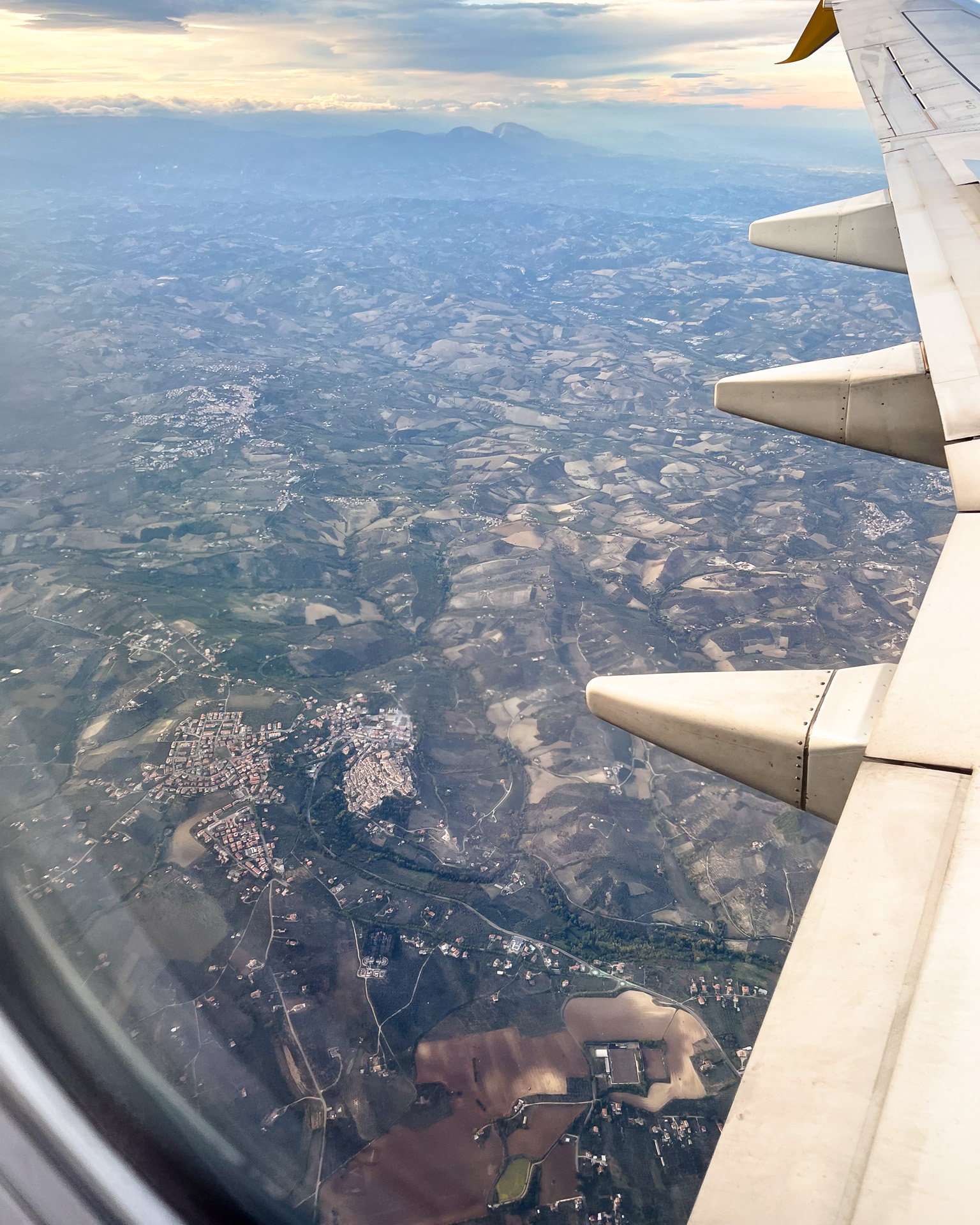 Aerial view from airplane window over countryside